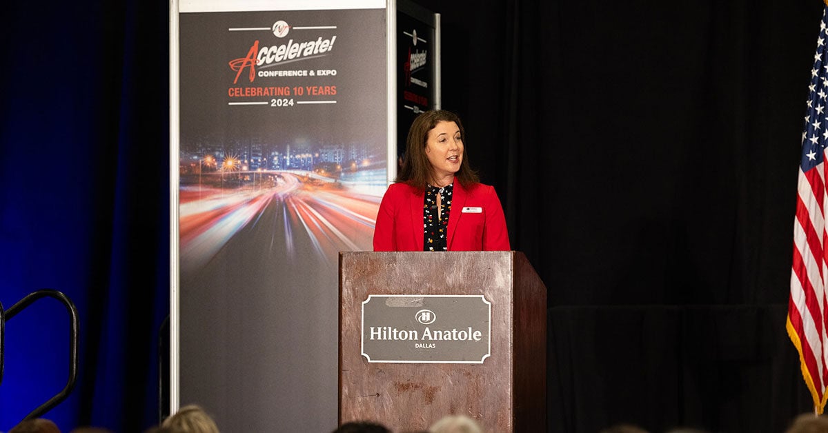 2024-Accelerate-Conference-Jennifer-Hedrick-Podium-1200x628