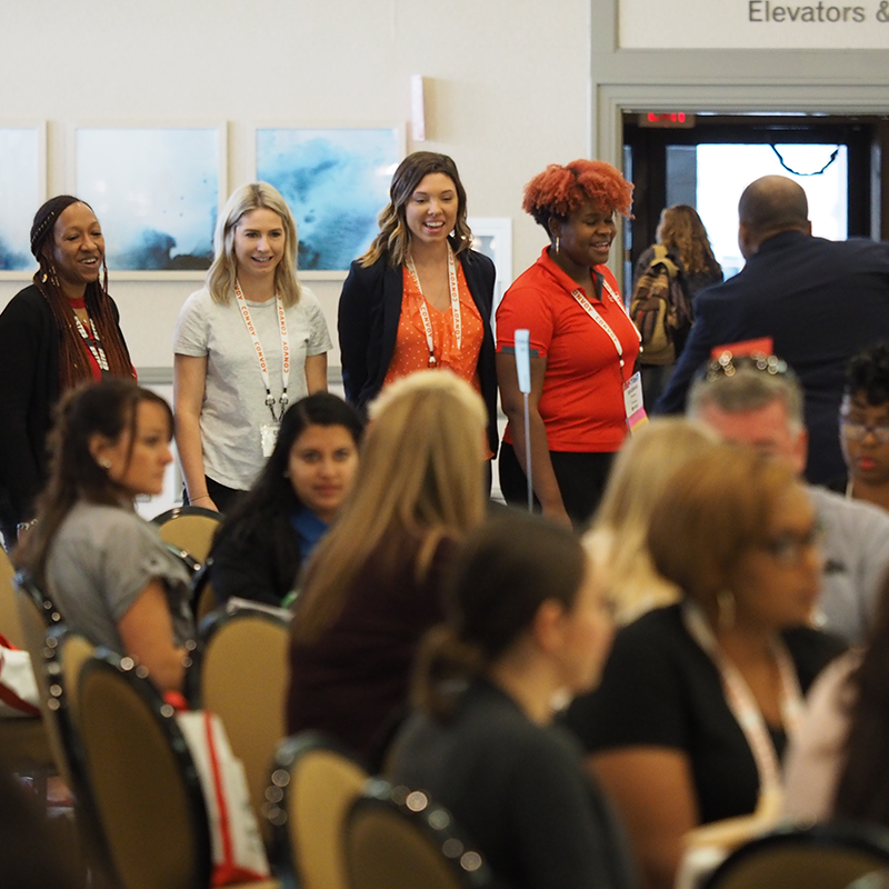 conference-attendees-standing-breakout-800x800
