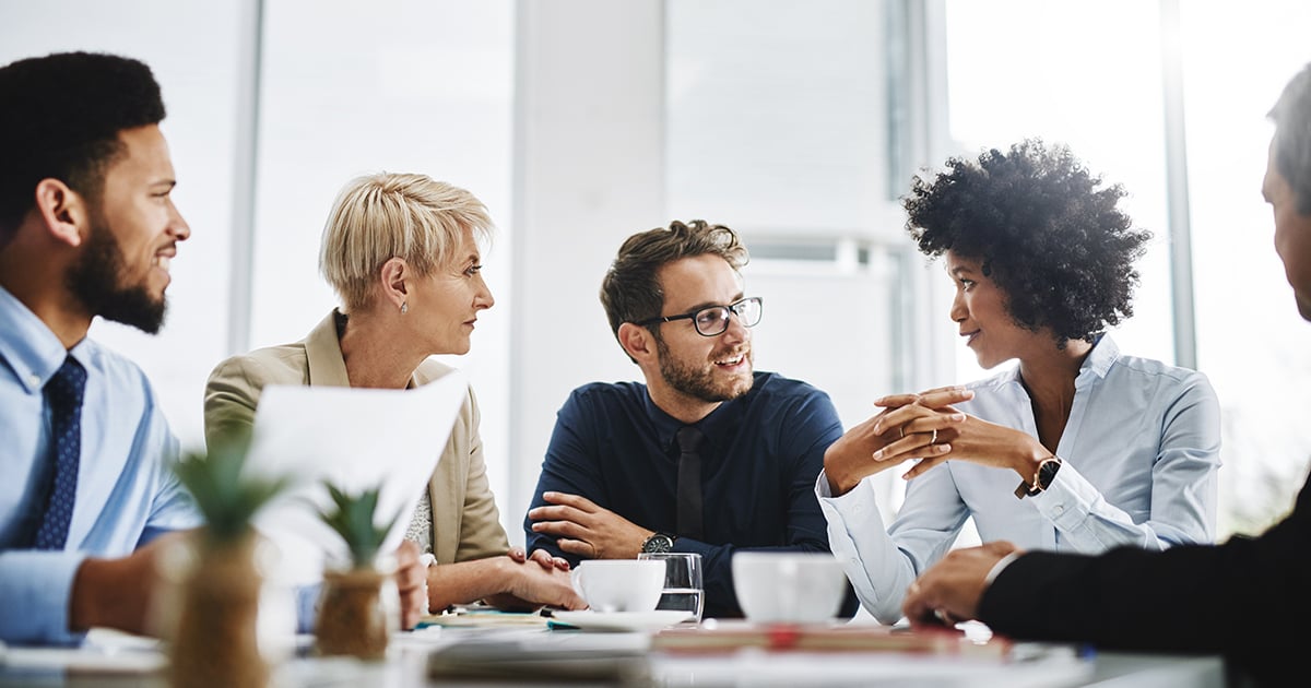 diverse-employees-talking-1200x630