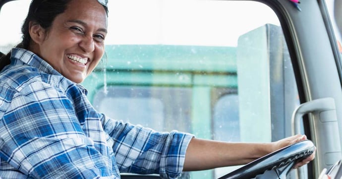 female-driver-cab-smiling-1200x628