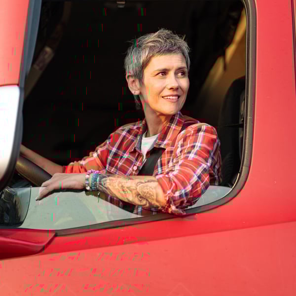 female-driver-in-cab-red-truck-1080x1080