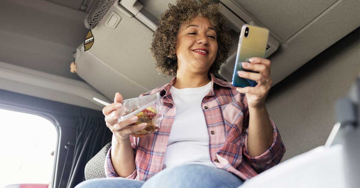 female-trucker-cab-eating-1200x628