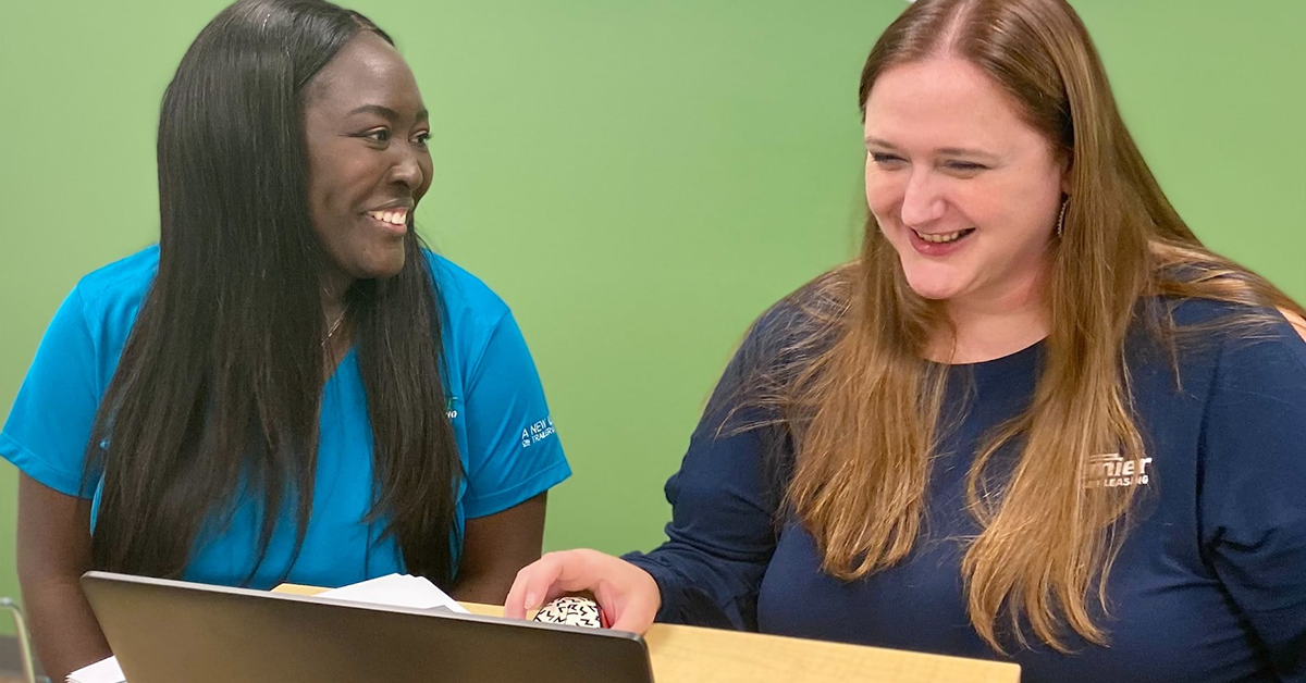 premier-trailer-leasing-female-employees-smiling-1200x628