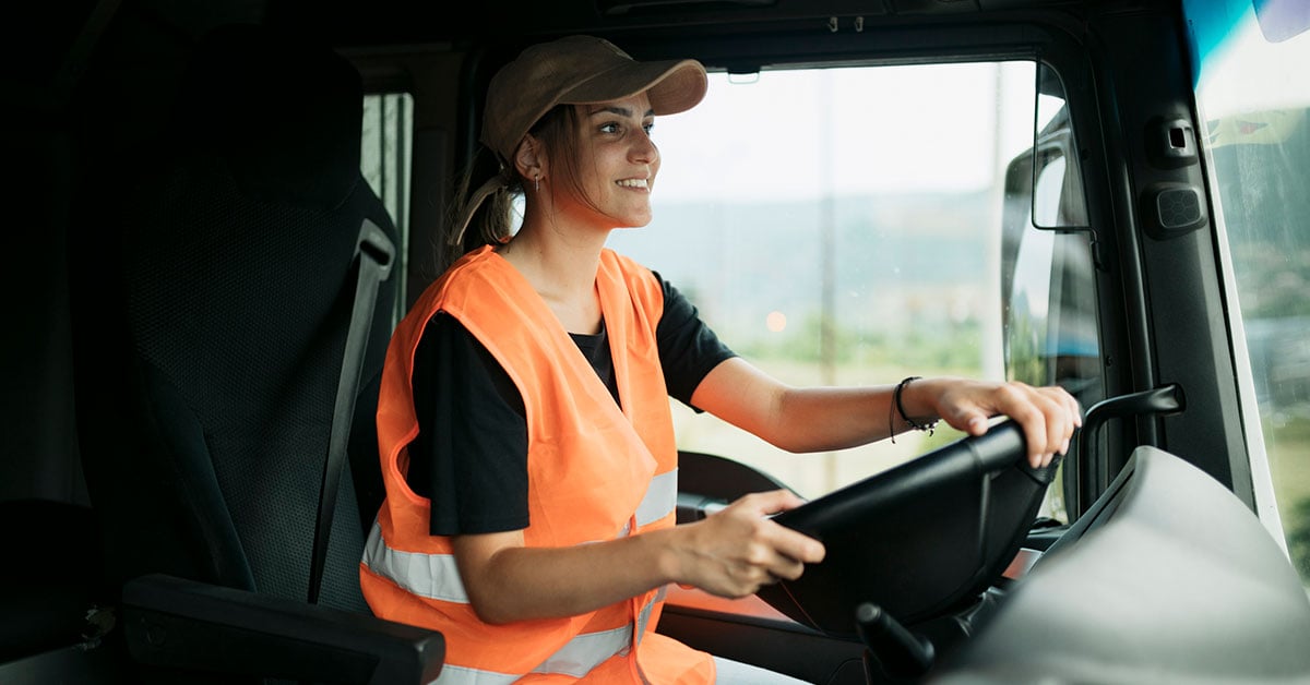 young-female-trucker-in-cab-1200x628