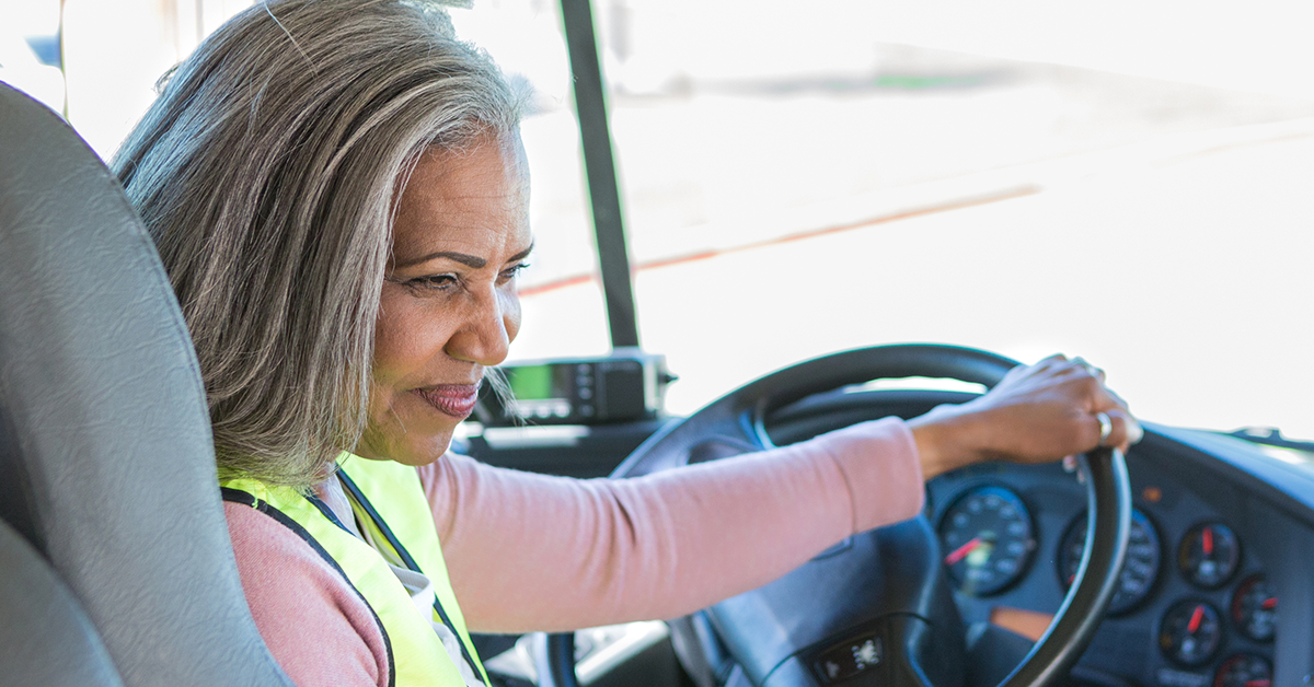 female-driver-at-wheel-side-profile-1200x628