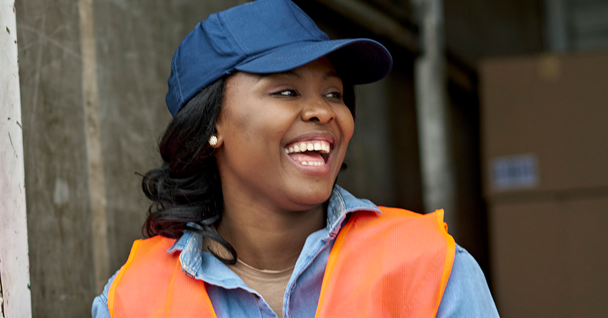 female-driver-smiling-side-profile-1200x628